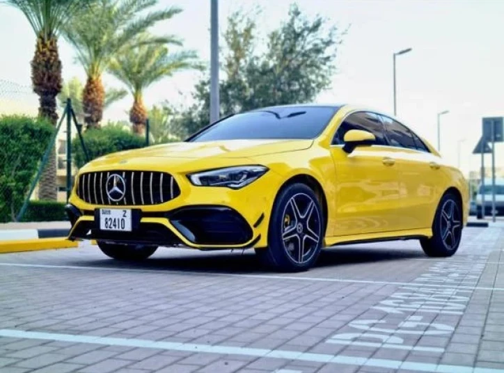 Mercedes Benz CLA45  2023 YELLOW RENTAL IN DUBAI - undefined